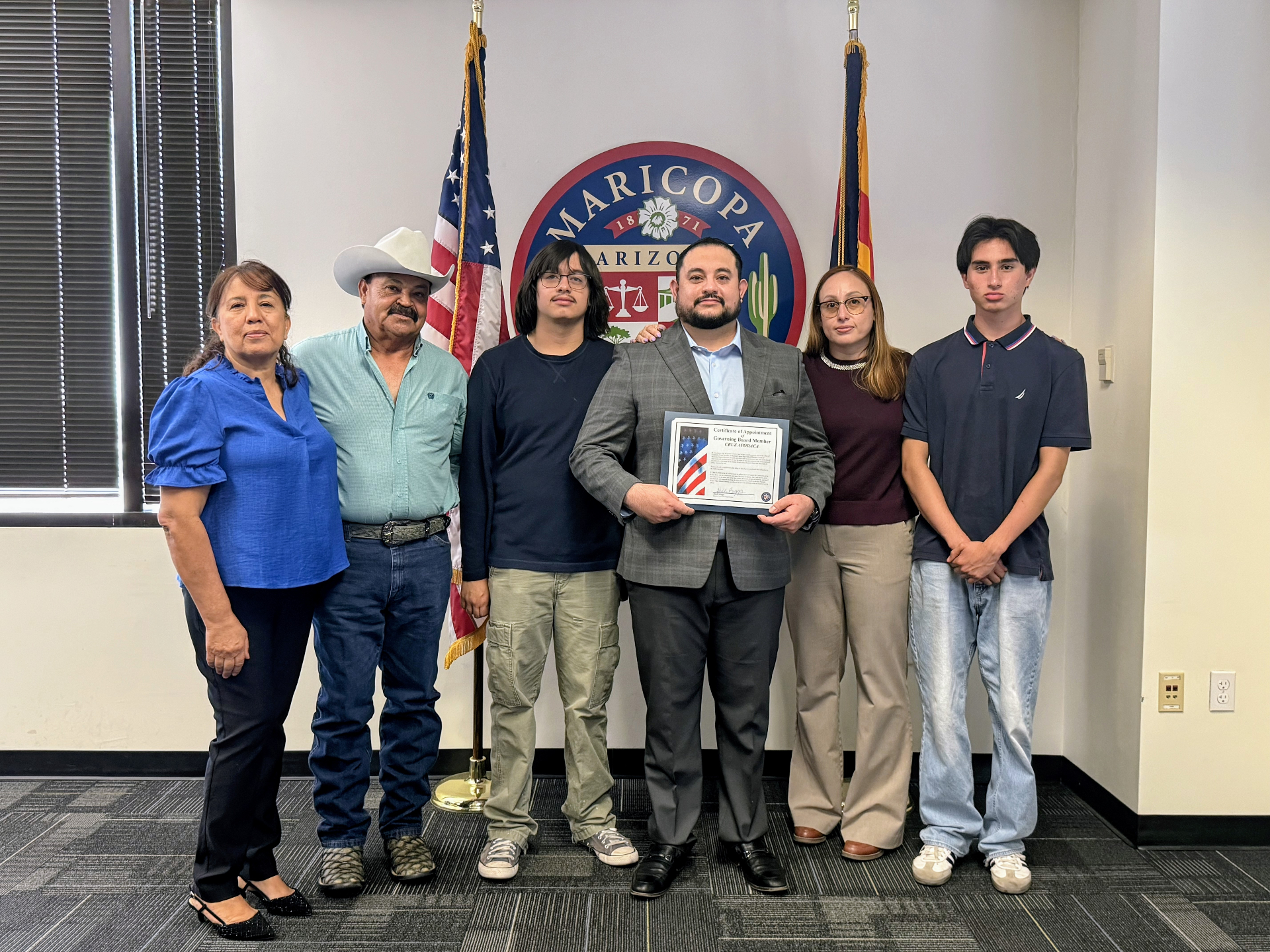 Cruz with his family after receiving Certificate of Appointment