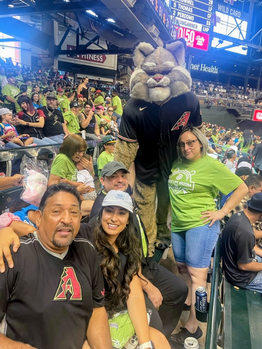 Cruz and family with the Diamondbacks mascot at the ballpark